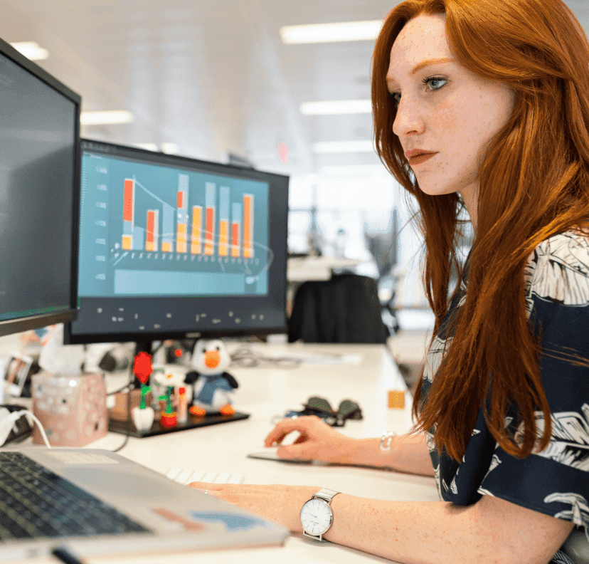 Girl working at desktop computer