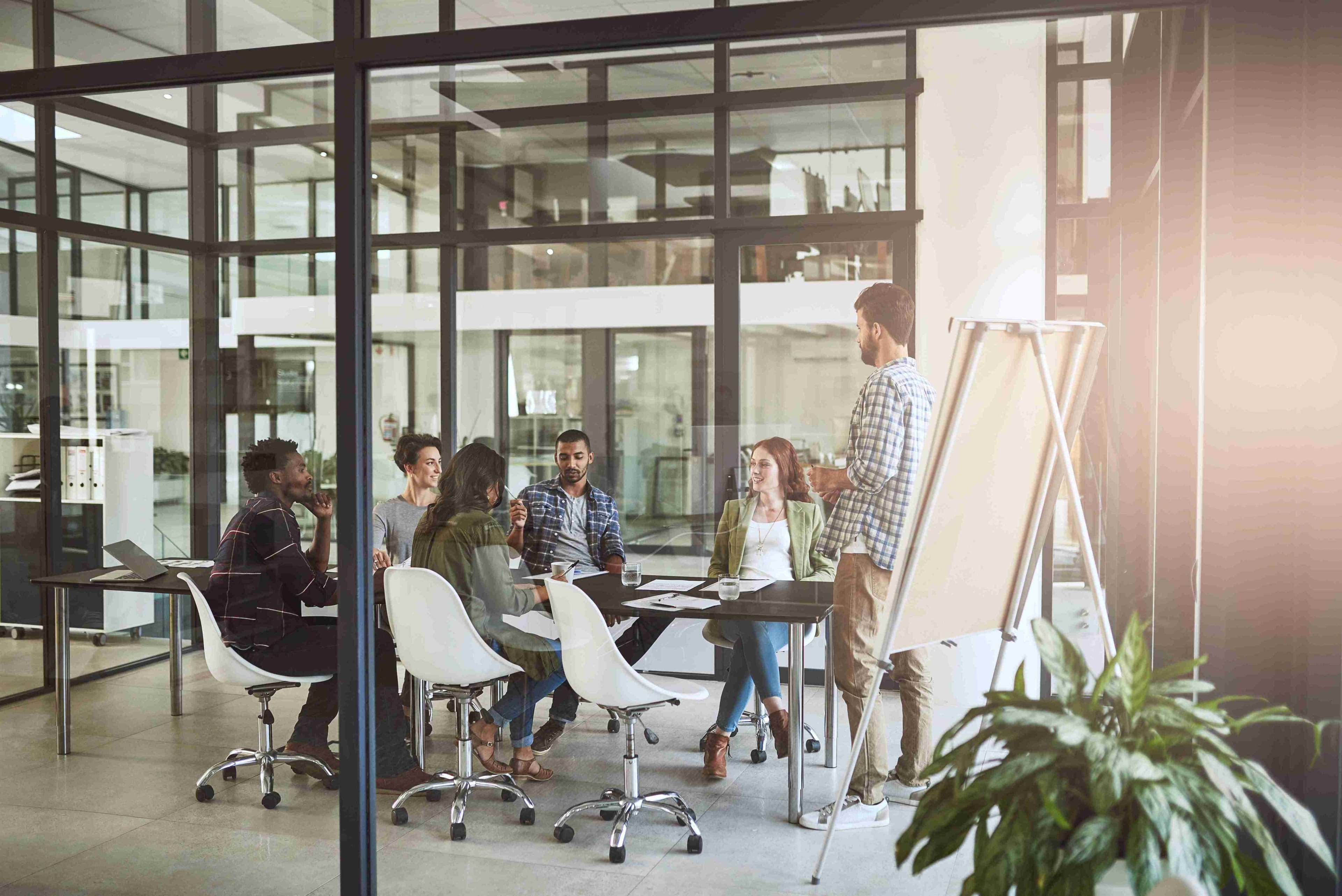 Team of adults working together in an office