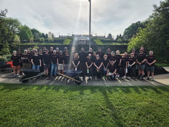 colleagues taking a group photo outside