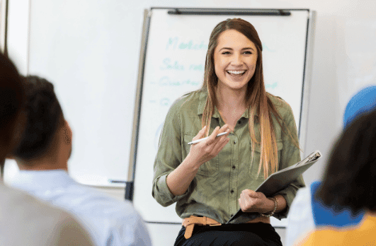 A young woman giving a professional presentation
